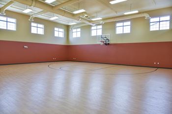 Indoor basketball court at Cardinal Point Apartments.